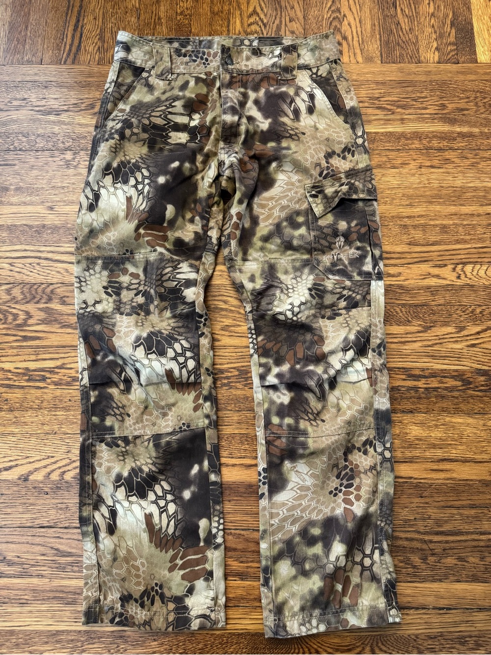 Kryptek men's hunting cargo pants, in the Highlander camouflage pattern.